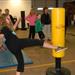 Woman Kicking Tae Bo Padded Practice Tube